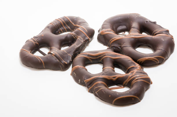 Macro shot of homemade chocolate dipped pretzels.