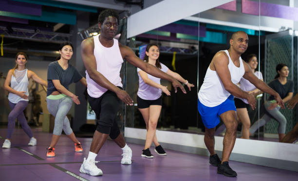 istock People dancing aerobics at lesson in gym 1466818138