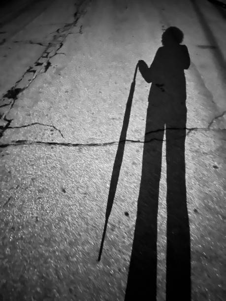 istock Shadow Umbrella in Street 1466830254