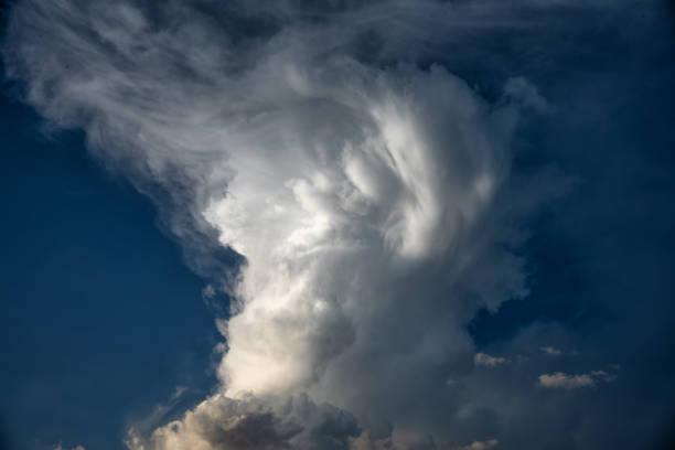 istock Stunning Vertical Storm Cloud During Summer at Sunset or Sunrise 1466855907