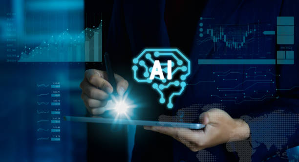 istock Businessman hand using pen mouse on tablet with glowing digital ai brian icon and graph on background. artificial intelligence technology concept. 1466886041