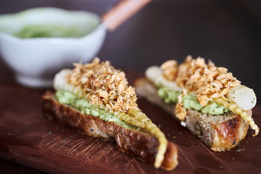 Delicious Brunch Toast, topped with tuna, bamboo shoots and avocado mashes