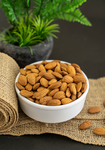 Almond day special image, Sweet almond on white bowl