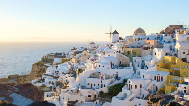 Oia Santorini Greece in the evening during sunset, traditional Greek village Oia Santorini Greece in the evening during sunset, a traditional Greek village in Santorini. santorin stock pictures, royalty-free photos & images