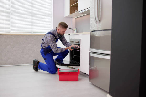 istock Young Man In Overall Repairing Washing 1466896178