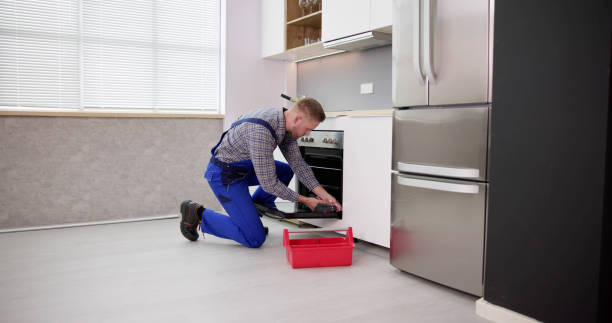 istock Young Man In Overall Repairing Washing 1466896212