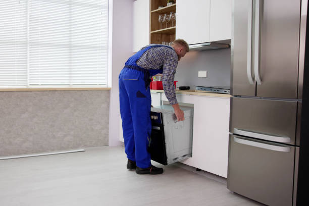 istock Oven Repair Technician. Appliance Maintenance Service 1466896234