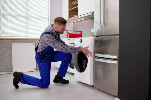 istock Young Man In Overall Repairing Washing 1466896236