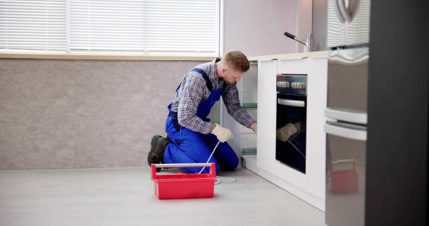 istock Plumber Drain Cleaning Services In Kitchen 1466896558