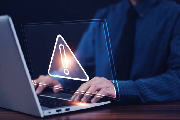 istock Cyber security and cybercrime. System hacked warning alert on Cyber attack on computer network, Virus, Spyware, Malware or Malicious software. 1466899783