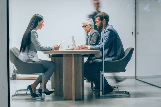 istock Team of professionals during a meeting. 1466901155