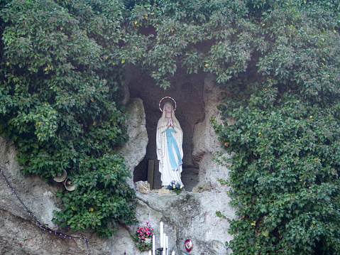 Sperongia Morfasso, Italy - 12nd february 2023 Statue of Our Lady of Immaculate Conception in the Grotto Our Lady of Lourdes in Sperongia.