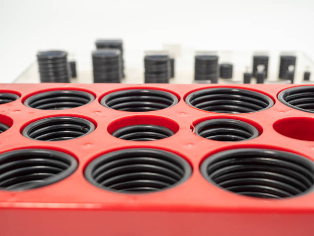 istock Hydraulic and pneumatic o-rings in black in different sizes on a white background. Rubber gaskets for plumbing. 1466911495