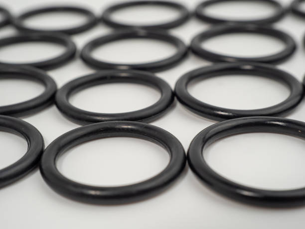istock Hydraulic and pneumatic o-rings in black in different sizes on a white background. Rubber gaskets for plumbing. 1466912098