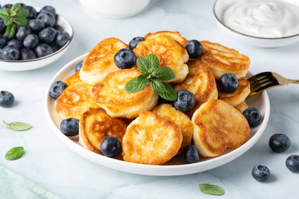 Homemade mini pancakes with blueberries