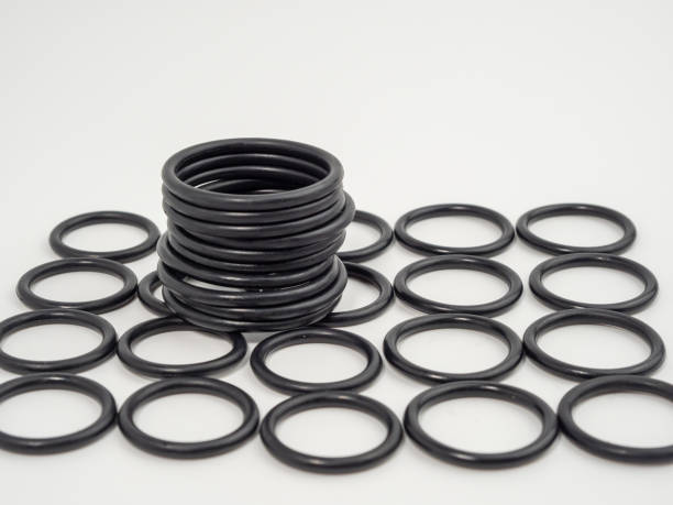 istock Hydraulic and pneumatic o-rings in black in different sizes on a white background. Rubber gaskets for plumbing. 1466912947