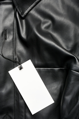 Black leather jacket and empty price label