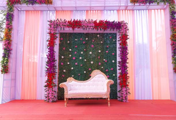 istock India Wedding event stage decorated with flower, chair, light 1466929012