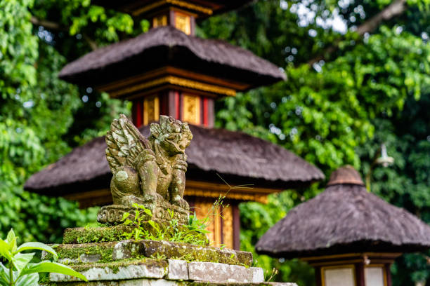 Temple in Ubud. Balinese Hinduism temple in a deep tropical forest.