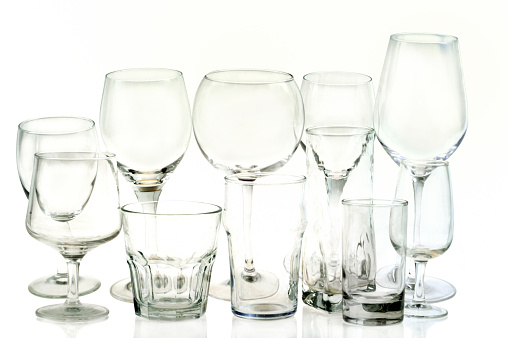 Different kinds of glasses close-up on a white background