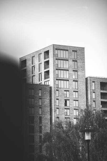 istock Vertical grayscale shot of modern buildings. 1466936822