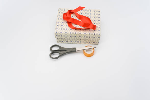 istock decorated paperboard box with lid on top and stationery on a white tabletop 1466940354