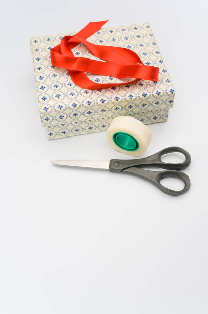 istock decorated paperboard box with lid on top and stationery on a white tabletop 1466940370