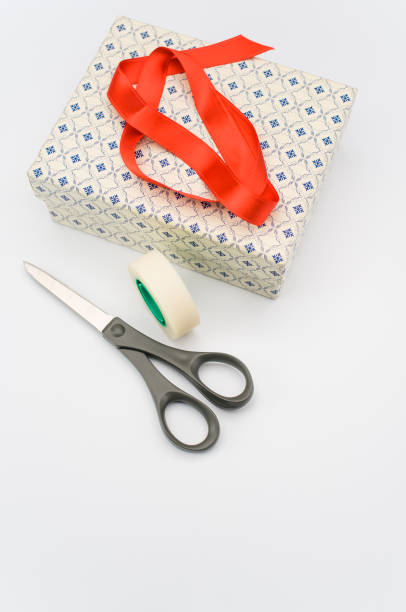 istock decorated paperboard box with lid on top and stationery on a white tabletop 1466940375