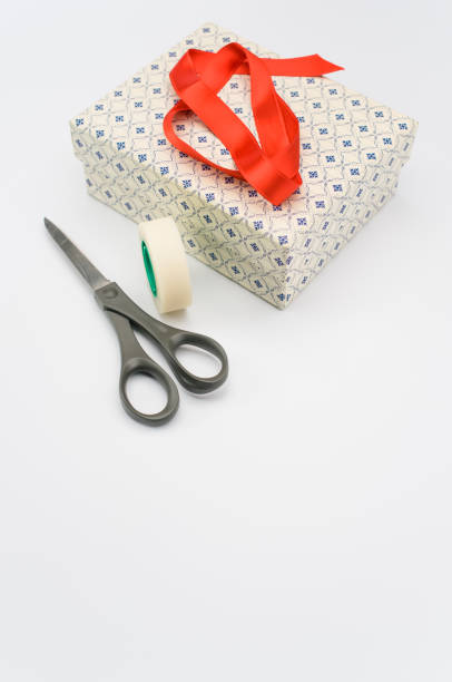 istock decorated paperboard box with lid on top and stationery on a white tabletop 1466940378