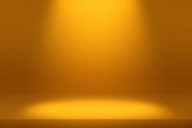 istock Orange abstract cement wall and studio room and spot lighting, interior texture for display products.wall background. 1466940516