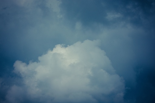 A beautiful shot of fluffy white cotton-like clouds in blue sky
