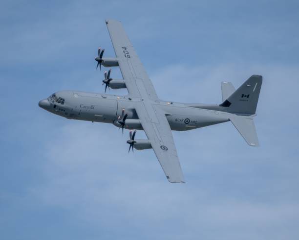 Toronto, Canada – September 11, 2022: The C-130 Hercules in-Flight against a clouded sky