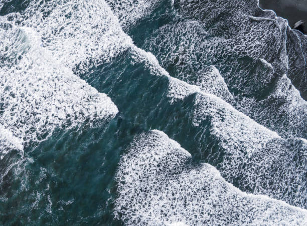 istock Aerial view of a wavy ocean 1466948244