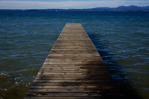A beautiful view of sea with wooden jetty