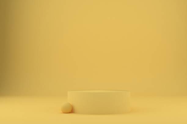 istock Product podium with yellow ball sphere on pastel yellow background. 1466955314