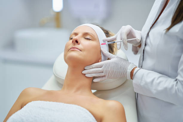 A scene of medical cosmetology treatments botulinum injection. A scene of medical cosmetology treatments botulinum injection. High quality photo botulinum toxin injection stock pictures, royalty-free photos & images