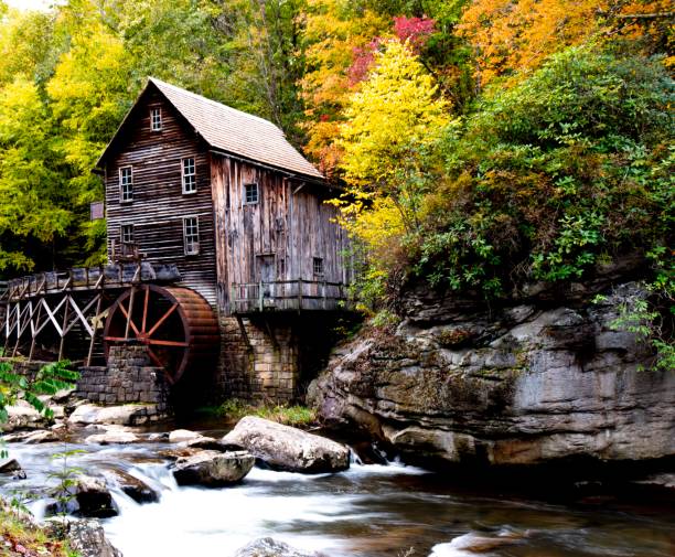 istock Photo of small house on a river 1466959097