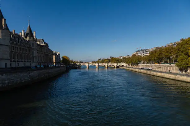 A beautiful shot of the Clock of the Cite Palace from the bridge