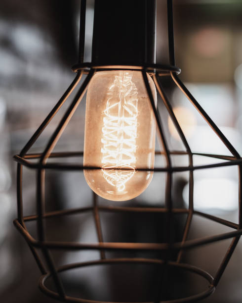 istock Selective of an abstract decorative lamp hanging in a cafe 1466968203