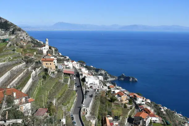 Panoramic view of the Italian village of Conca dei Marini on the Amalfi coast. The small town is distributed on various levels of the mountain to the