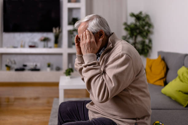 istock A senior man is experiencing everyday chronic pain in his head. 1466979756