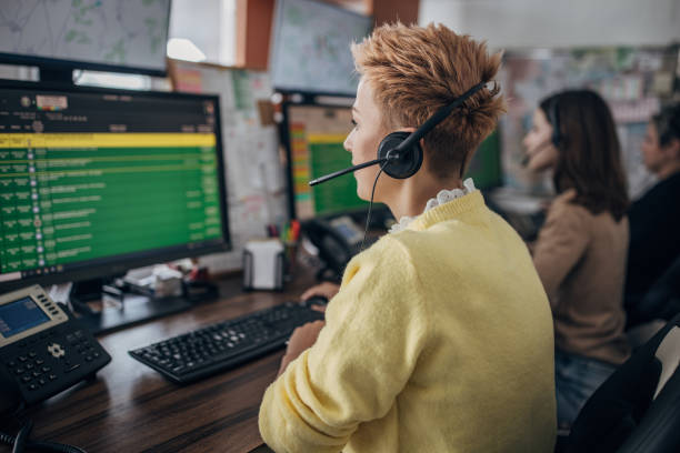 istock Taxi service operators in office 1466980078