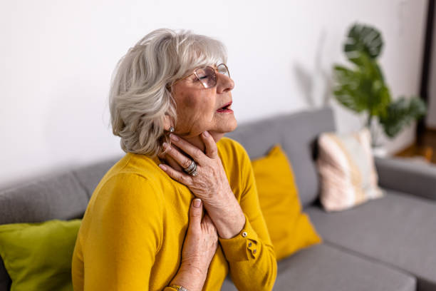 istock A senior grey-haired woman has chronic everyday problems with her respiratory system. 1466981045