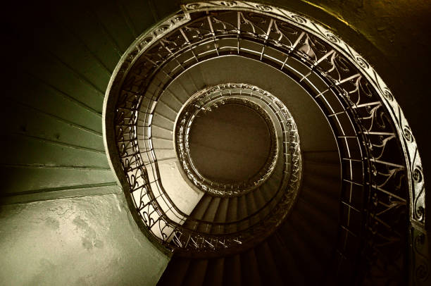 istock Green staircase with winding stairs, natural delicate light 1466981120