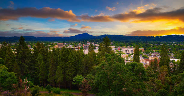 Sunset over Eugene, Oregon, from Skinner Butte Lookout Sunset over Eugene, Oregon, viewed from Skinner Butte Lookout. eugene oregon stock pictures, royalty-free photos & images