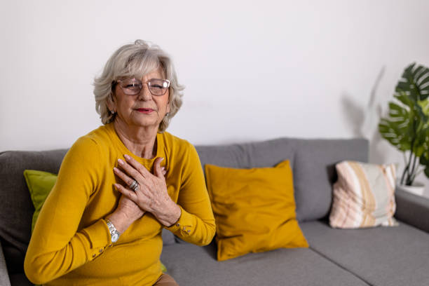 istock A lonely older woman with chronic breathing and heart problems is desperate while struggling with insufferable pain in her chest. 1466981761