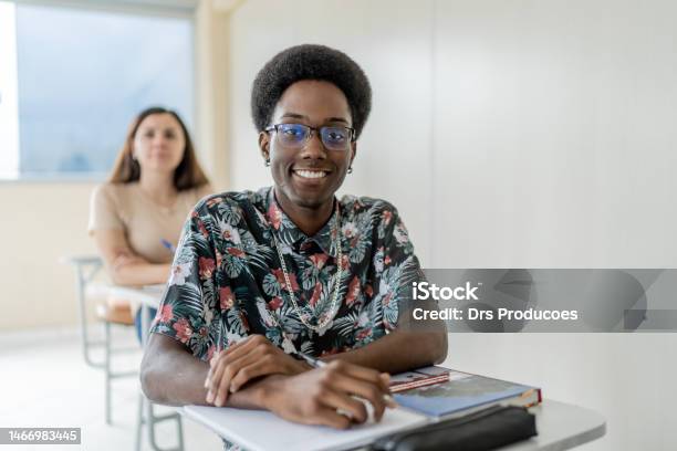 Portrait Of Smiling Young Black Man In College Stock Photo - Download Image Now - Brazil, 16-17 Years, 20-24 Years