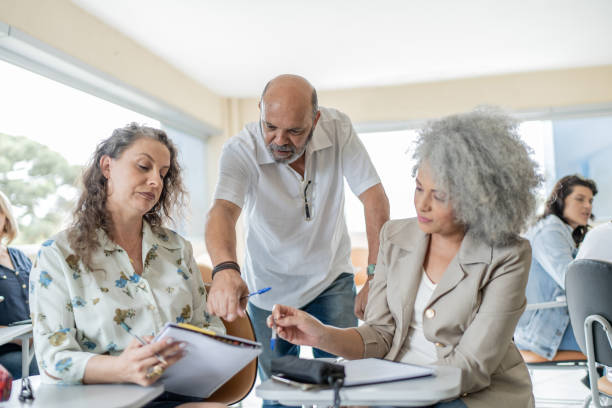 istock Adult students debating in college 1466983931