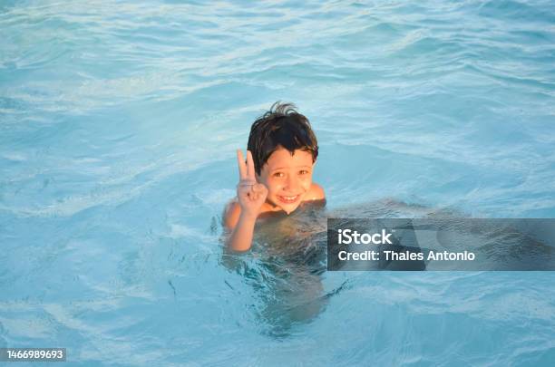 Funny Happy Boy Playing In The Pool Stock Photo - Download Image Now - 6-7 Years, Activity, Beach