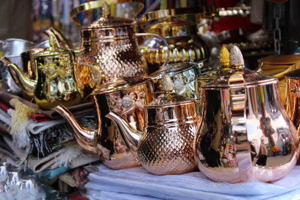 istock copper teapots in the store. Medina saudi Arabia 1466991373